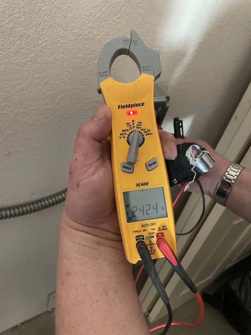 Voltage testing with clamp meter during Generator Installation in Orangetree